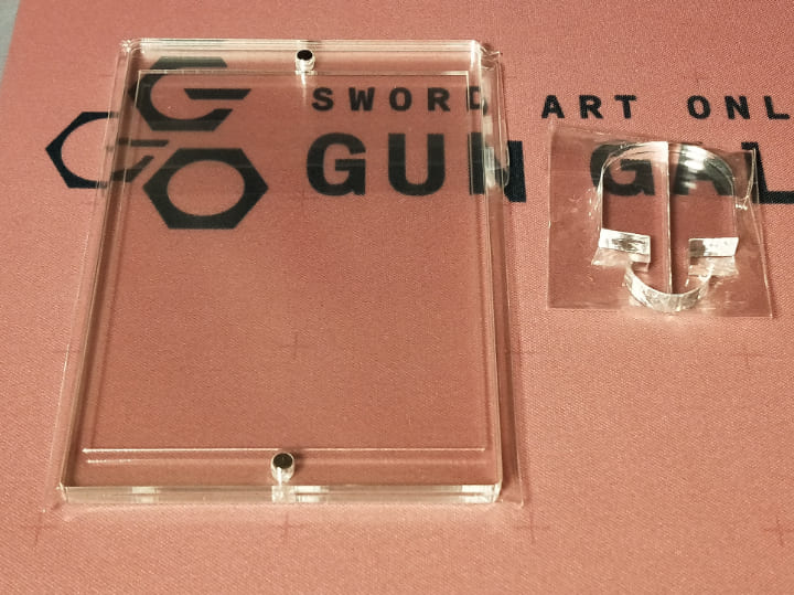with:Dのネオジムマグネットtypeレギュラーサイズスタンド脚付(neodymium-magnet-type-regular)。商品とスタンドを取り出した写真。